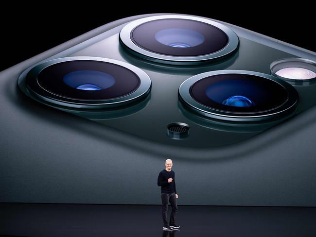 TOPSHOT - Apple CEO Tim Cook speaks on-stage during a product launch event at Apple's headquarters in Cupertino, California on September 10, 2019. - Apple unveiled its iPhone 11 models Tuesday, touting upgraded, ultra-wide cameras as it updated its popular smartphone lineup and cut its entry price to $699. (Photo by Josh Edelson / AFP)