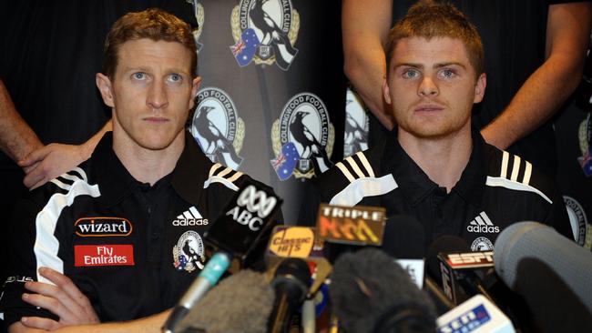 Heath Shaw faces the media alongside then Magpies captain Scott Burns.