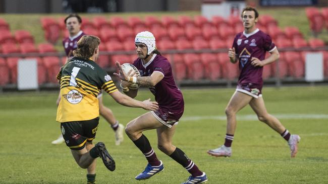 Dalby’s Kristian Bond takes on the Wattles line during the TRL President's Cup Reserve Grade final. Picture: Kevin Farmer