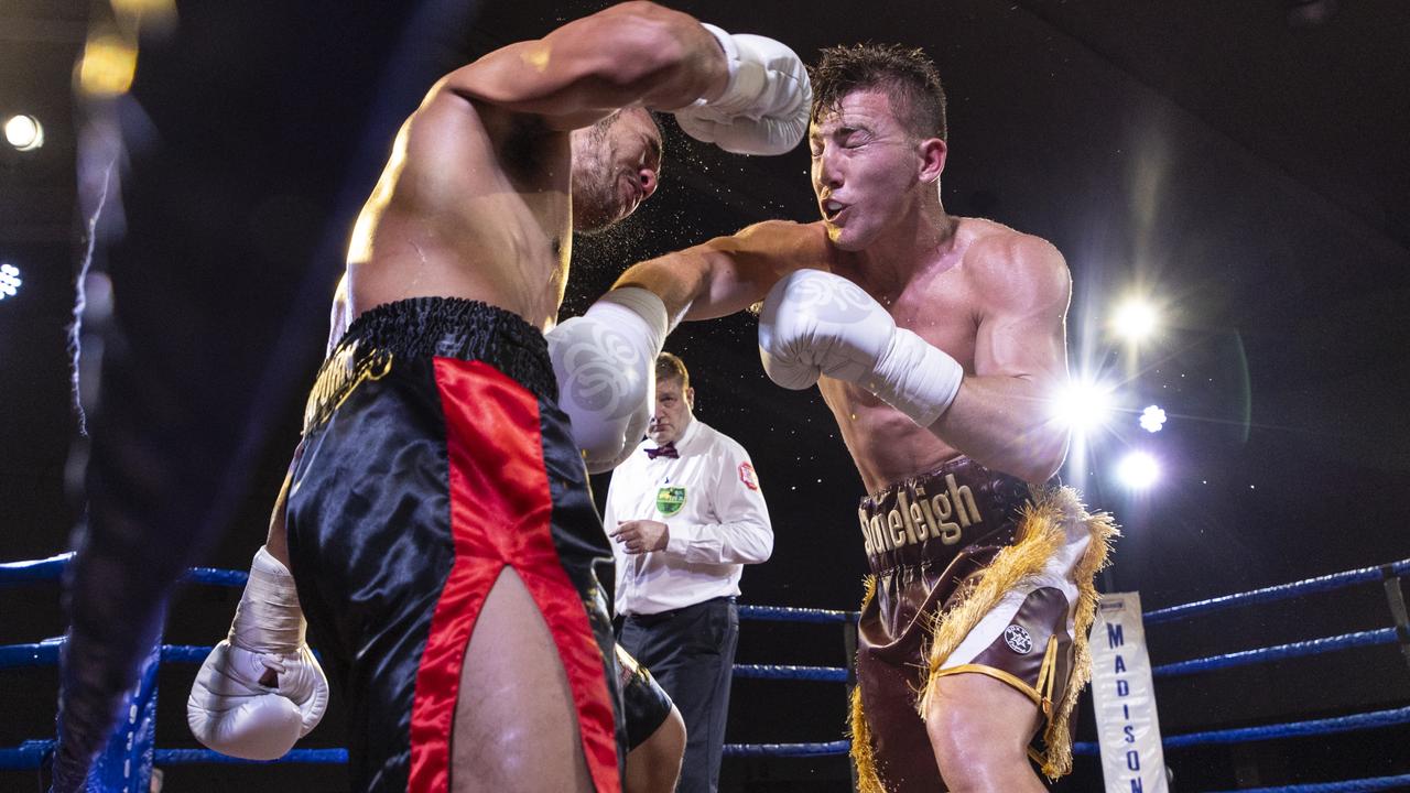 Jackson Griffiths and Frankie Srisang trade blows. Picture: Darren Burns