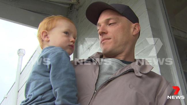 Baby Arli reunited with his dad. Picture: 7NEWS