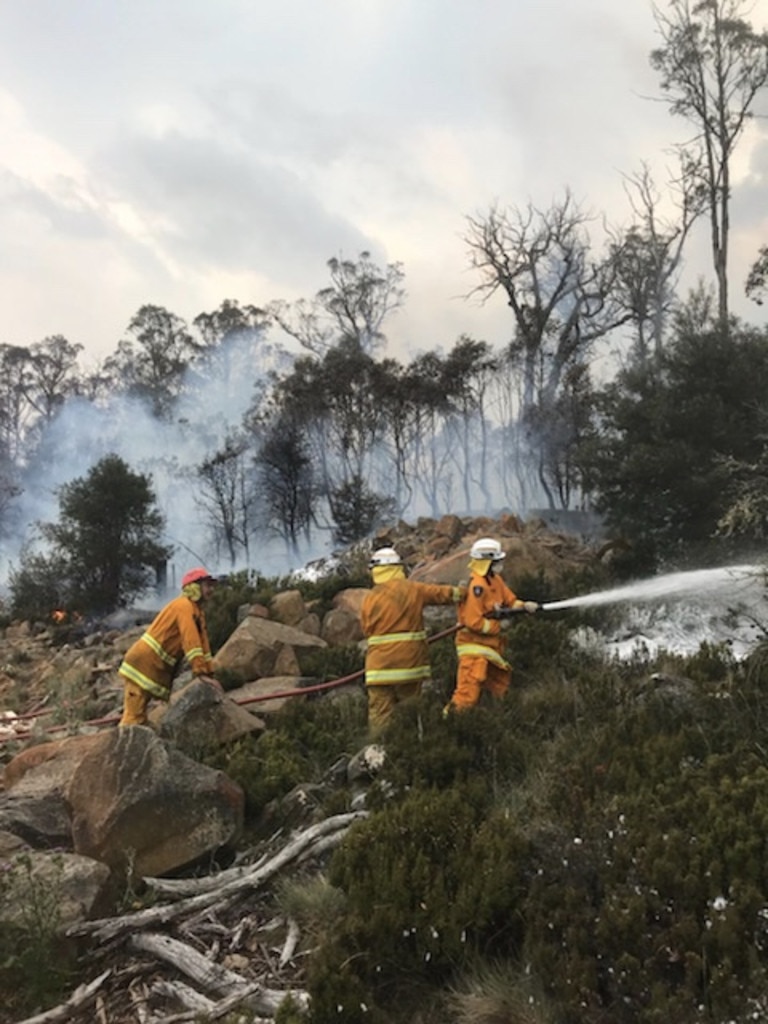 Firefighters at work battling blazes in Tasmania's Central Highlands. Picture: Tara Felts