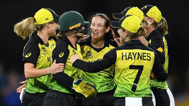 Megan Schutt, centre, celebrates with teammates after taking the wicket of Dane Van Niekerk of South Africa during the Women's T20 World Cup Semi-Final. Picture: AAP