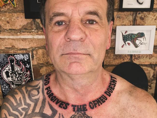 Former CFMEU boss John Setka shows off new ink with a tattoo reading, God Forgives The CFMEU Doesn’t, on his neck. Supplied