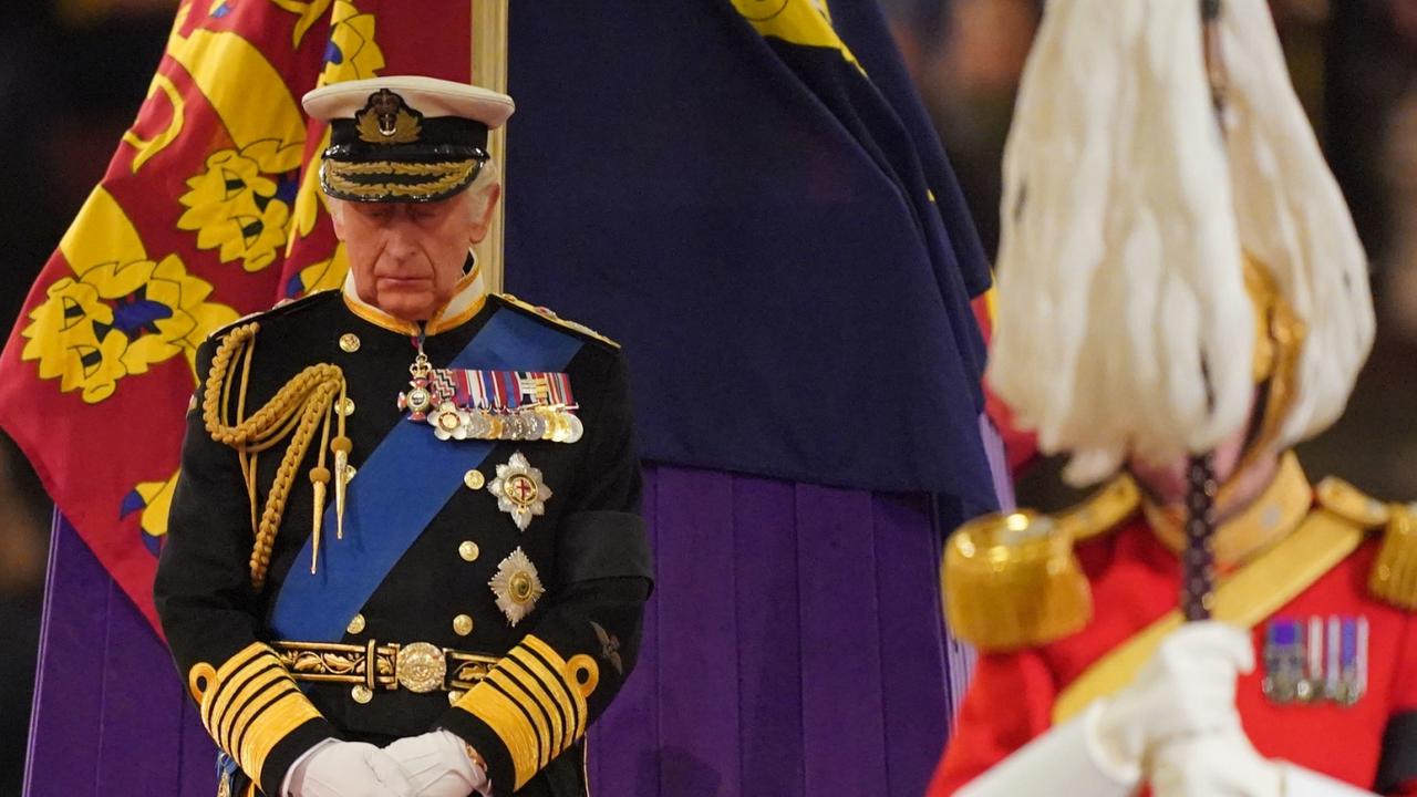 King Charles III stands vigil beside the coffin of his mother, Queen Elizabeth II, as it lies in state on the catafalque in Westminster Hall, at the Palace of Westminster. (Photo Dominic Lipinski – WPA Pool/Getty Images)