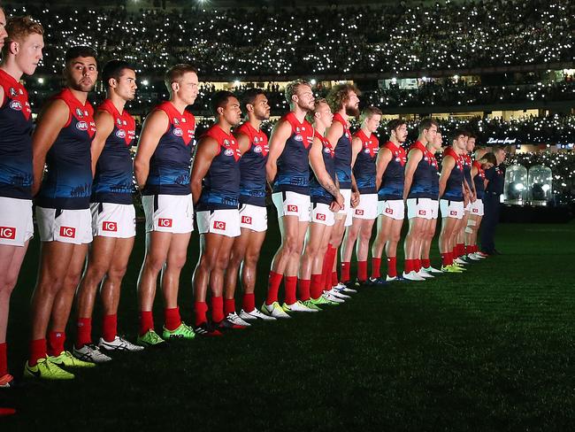 AFL Round 5. Richmond vs. Melbourne at the MCG . Both teams line up for the playing of the last post and national anthem     . Pic: Michael Klein