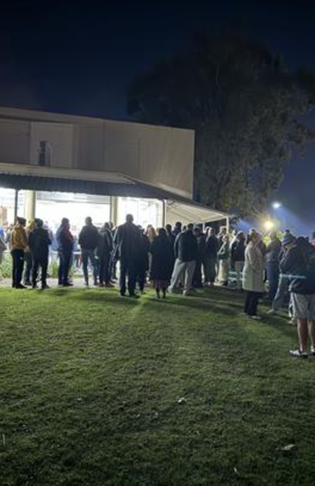 People outside Mt Eliza Community Hall before the club's special general meeting in June.