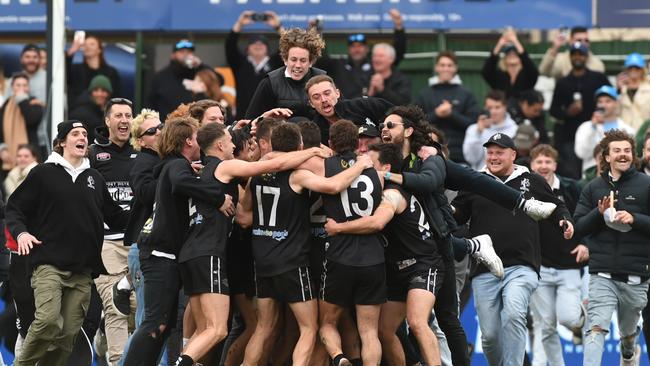 Port District players and fans celebrate their drought-breaking grand final win in 2022. Picture: Tricia Watkinson