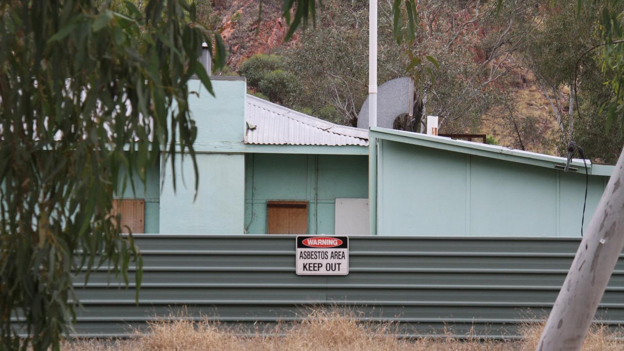 Overgrown grass surrounds the empty buildings in the St Mary's Hostel complex, Alice Springs. Picture: Gera Kazakov