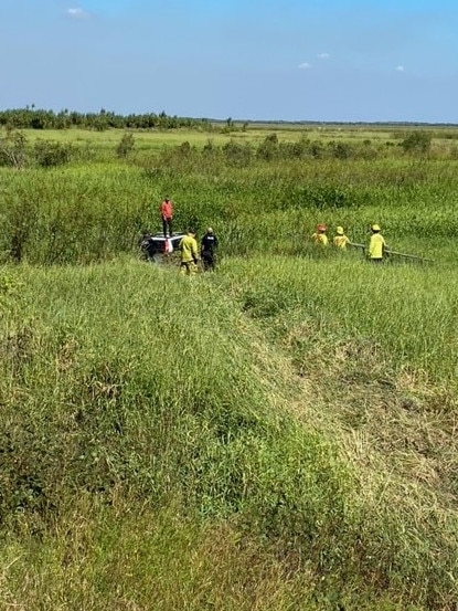 Emergency Services used a ladder to rescued Raed Zannoun who ended up in croc infested waters just off the Arnhem Hwy. Picture: NT Police Senior Constable Steven Downie