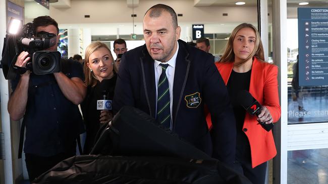 Outgoing Wallabies coach Michael Cheika arrives at Sydney International Airport on Tuesday following Australia’s disastrous World Cup campaign in Japan. Picture: Brett Costello