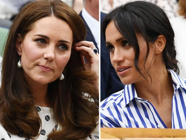 LONDON, ENGLAND - JULY 14:  Catherine, Duchess of Cambridge and Meghan, Duchess of Sussex attend day twelve of the Wimbledon Lawn Tennis Championships at All England Lawn Tennis and Croquet Club on July 14, 2018 in London, England.  (Photo by Clive Mason/Getty Images)