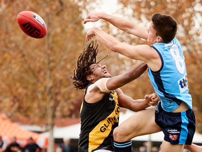 Wanderers utility Neil Vea Vea – playing for Glenelg in the SANFL – competes for possession with Sturt’s Jack Stephens at Unley Oval. Picture: Matt Loxton/AAP Image