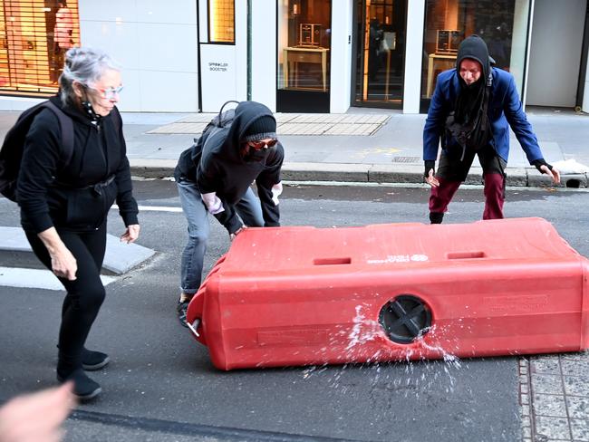 Blockade Australia protesters march through Sydney's CBD on June 27 disrupting the traffic. Picture: NCA NewsWire.