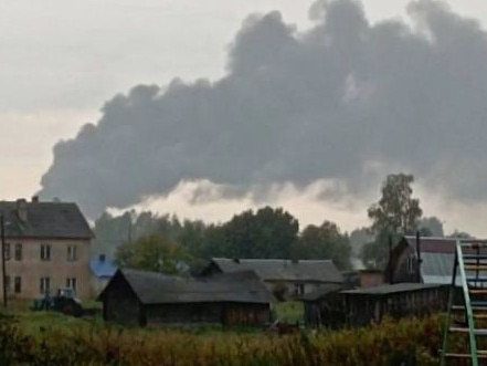 Smoke was seen billowing over the nearby villages to Soltsy air base following the strike. Picture: Supplied