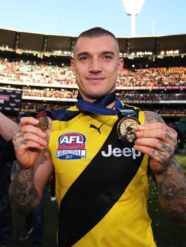 Dustin Martin with his Norm Smith and premiership medals. Picture: Phil Hillyard