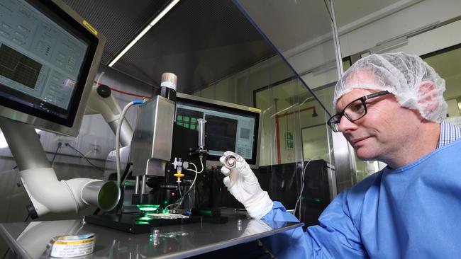 Vaxxas chief development and operations officer Angus Forster in a lab at the Translational Research Institute. A new manufacturing facility that will develop more vaccines has been announced under the State Government’s Queensland Jobs Fund. Picture: Annette Dew