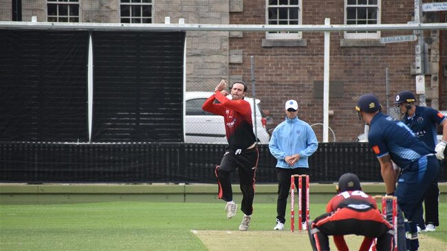 Rob Aitken bowls against Manly at Manly Oval. Photo: North Sydney Cricket