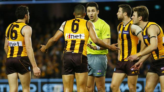 AFL Round 21 - Hawthorn v Port Adelaide at Etihad Stadium , Josh Gibson not happy with umpire Jordan Bannister. Melbourne. 21st August 2015. Picture: Colleen Petch.