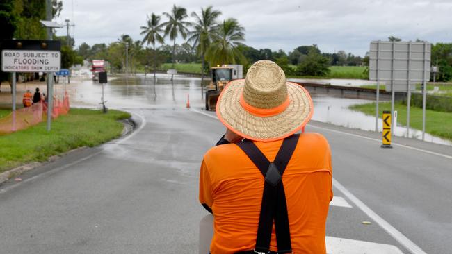 Sunday  February 9. Heavy rain causes flooding in North Queensland. Flooding at Plantation Creek in Ayr cuts Bruce Highway to traffic apart from trucks. Picture: Evan Morgan