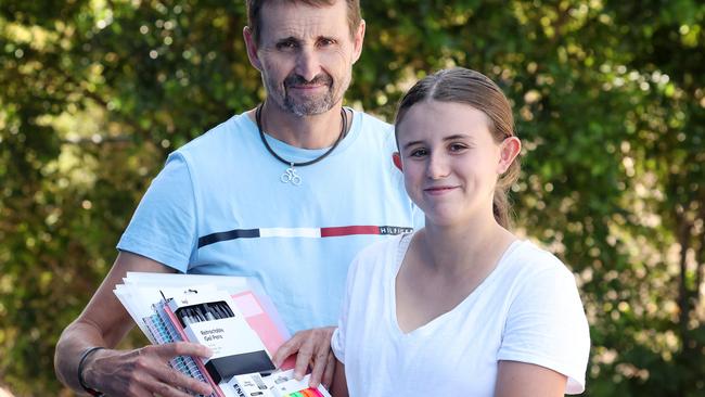 Richard Gray of the Grange with daughter Phoebe Gray, 15, with school supplies, Wilson. Picture: Liam Kidston