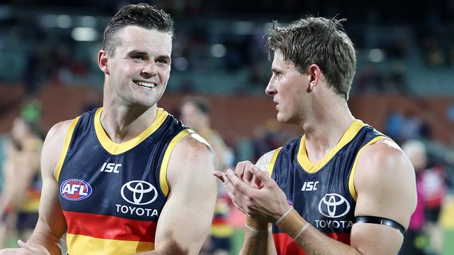 Brad Crouch talks with his brother Matt after the club’s loss to Richmond. Picture: Sarah Reed