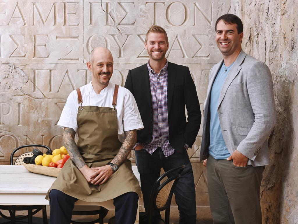 Apprentice chef Emmett McLeod with Menulog’s Morten Belling and NICI’s Nathan Lovett at Alpha. Picture: Adam Hollingworth.