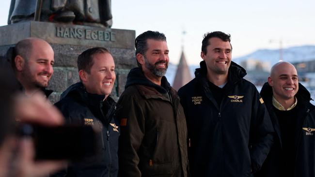 Donald Trump Jr (centre) poses after arriving in Greenland, the autonomous Danish territory coveted by Trump Sr. Picture: AFP