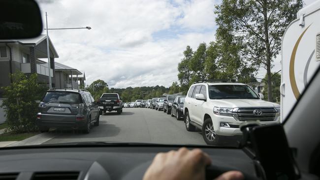 A commuter struggles to find a parking spot following the installation of new parking restrictions. Picture: AAP IMAGE / Tim Pascoe