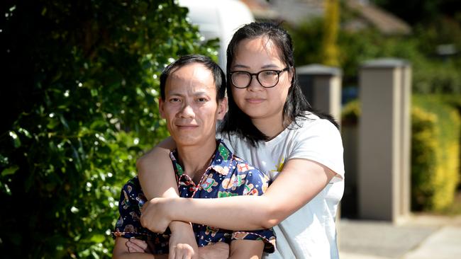 Phong Nguyen and his wife Thu Le outside their Springvale home. Mr Nguyen performed CPR on his neighbour's 11 month-old daughter after she fell into a shallow fish pond.