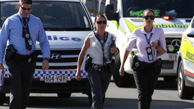 Senior police officers arrive at Dreamworld on the day of the tragedy. Photo: Regi Varghese