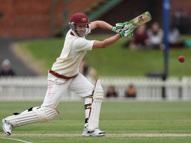 Premier Cricket grand final: Fitzroy Doncaster v Ringwood at Junction Oval. Fitzroy Doncaster batsman Peter Dickson drives a  ball on his way to  an unbeaten 58 on day one. Picture: Chris Eastman