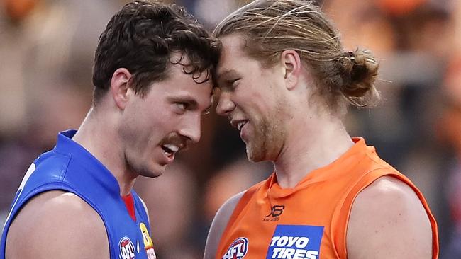 SYDNEY, AUSTRALIA - SEPTEMBER 07: Harry Himmelberg of the Giants remonstrates with Zaine Cordy of the Bulldogs during the 2019 AFL Second Elimination Final match between the GWS Giants and the Western Bulldogs at Giants Stadium on September 07, 2019 in Sydney, Australia. (Photo by Dylan Burns/AFL Photos via Getty Images)