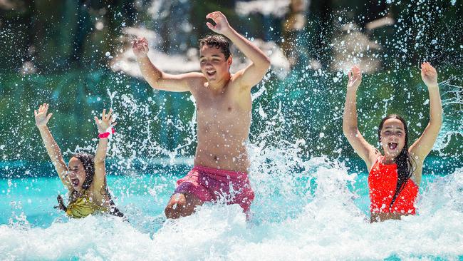 Siblings Coco, 8, Zayne, 14, and Scarlett, 12, give the wave pool a test run at Funfields. Picture: Mark Stewart