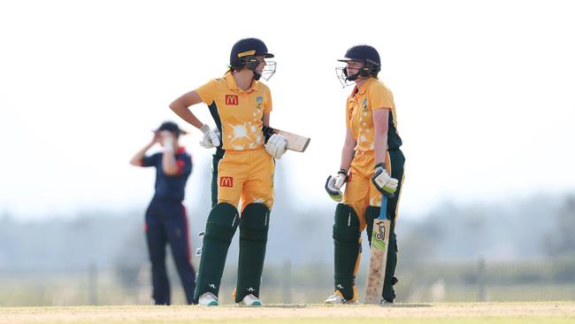 North Coastal batters discussing strategy. Picture: Sue Graham