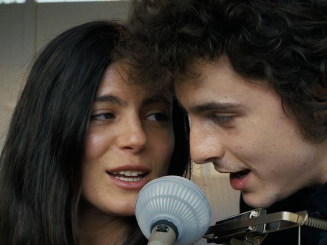 Timothee Chalamet as Bob Dylan and Monica Barbaro as Joan Baez in A Complete Unknown.