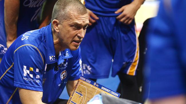 Brisbane coach Andrej Lemanis talks to his players during the loss to Adelaide.