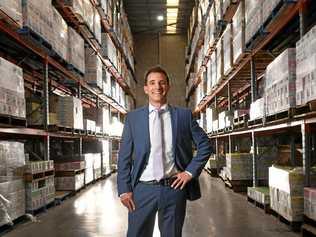 GLOBAL AMBITIONS: Trisco Foods chief executive officer Mike Tristram in their Carole Park warehouse. Picture: Rob Williams