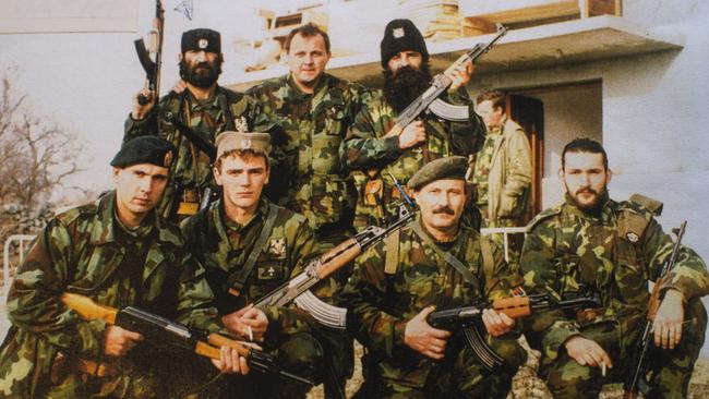 Zoran Tadic, centre of the back row, with members of his brigade. 