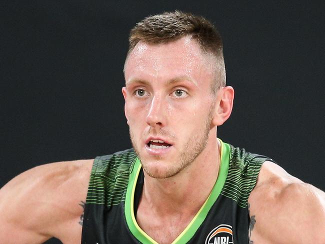 MELBOURNE, AUSTRALIA - FEBRUARY 21: Mitch Creek of the Phoenix passes the ball during the NBL Cup match between the South East Melbourne Phoenix and the Brisbane Bullets at John Cain Arena on February 21, 2021, in Melbourne, Australia. (Photo by Martin Keep/Getty Images)
