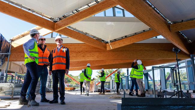 Multiplex executives Daniel Murphy and Michael Guilday with Sydney Fish Market boss Greg Dyer during a tour of the new Sydney Fish Markets in Glebe. Pictures: Justin Lloyd, Joe Castro/ AAP
