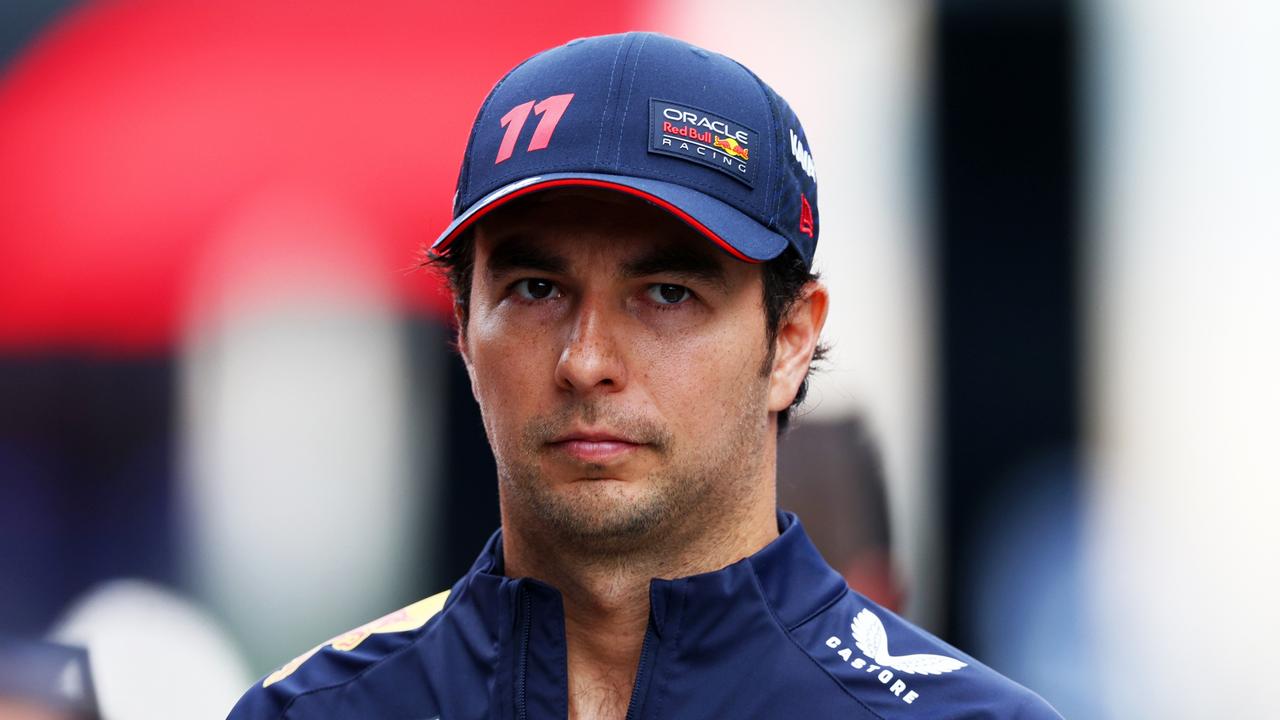 SPIELBERG, AUSTRIA – JUNE 30: 15th placed qualifier Sergio Perez of Mexico and Oracle Red Bull Racing looks on in the Paddock after qualifying ahead of the F1 Grand Prix of Austria at Red Bull Ring on June 30, 2023 in Spielberg, Austria. (Photo by Clive Rose/Getty Images)