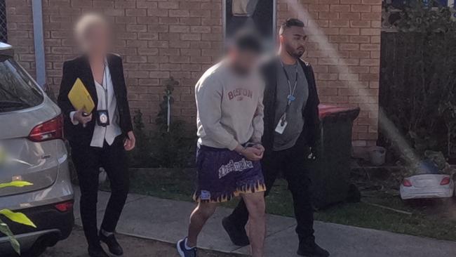 Officers arrest a man. Picture: NSW Police