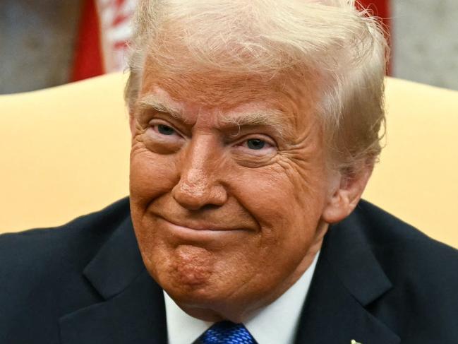 US President Donald Trump looks on during a meeting with Japanese Prime Minister Shigeru Ishiba in the Oval Office of the White House in Washington, DC, on February 7, 2025. (Photo by Jim WATSON / AFP) / ALTERNATE CROP