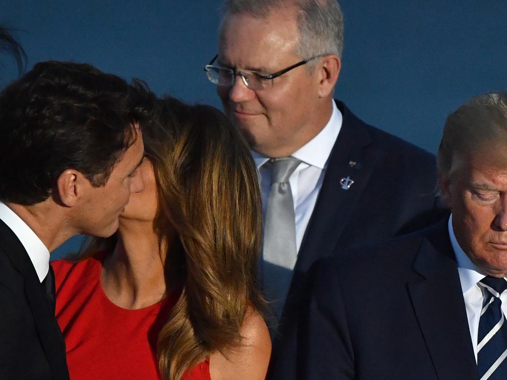 Justin and Melania have a moment while ScoMo and Trump look awkward. Picture: AAP Image/Mick Tsikas.