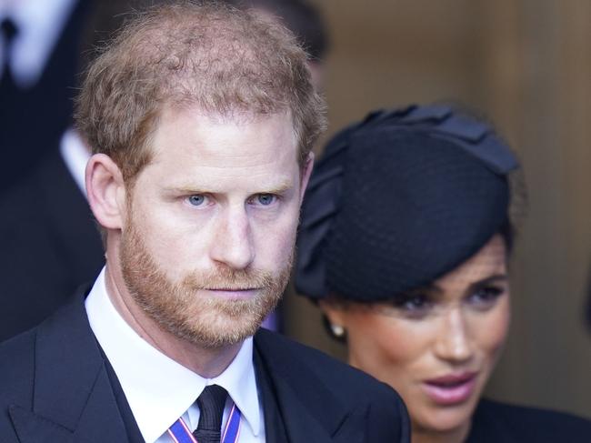 LONDON, ENGLAND - SEPTEMBER 14: Prince Harry and Meghan, Duchess of Sussex leave Westminster Hall, London after the coffin of Queen Elizabeth II was brought to the hall to lie in state ahead of her funeral on Monday on September 14, 2022 in London, England. Queen Elizabeth II's coffin is taken in procession on a Gun Carriage of The King's Troop Royal Horse Artillery from Buckingham Palace to Westminster Hall where she will lay in state until the early morning of her funeral. Queen Elizabeth II died at Balmoral Castle in Scotland on September 8, 2022, and is succeeded by her eldest son, King Charles III. (Photo Danny Lawson - WPA Pool/Getty Images)