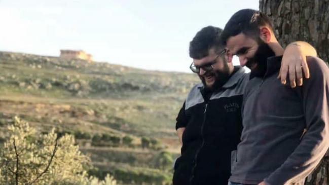 Ibrahim Bazzi, left, with his brother Ali, who were killed in an Israeli air strike targeting the town of Bint Jbeil in Lebanon.