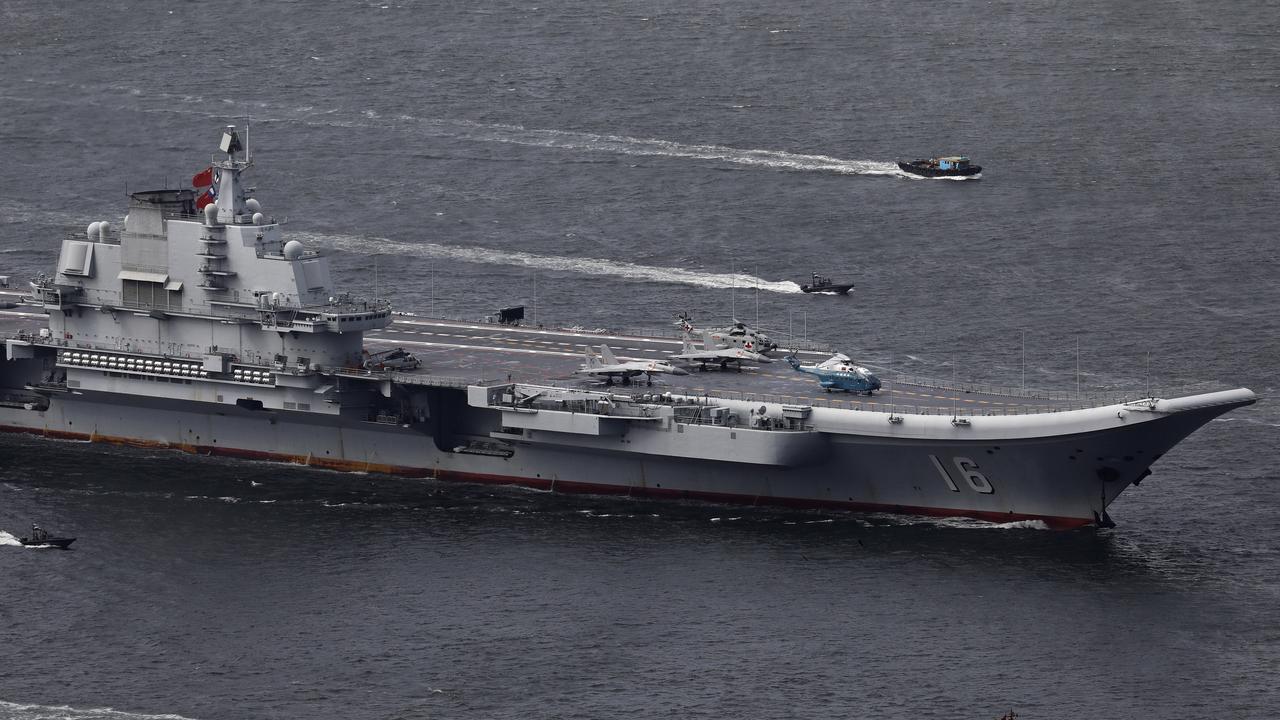 Satellite photos reveal Chinese aircraft carrier Type 002 | Herald Sun