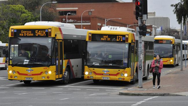 Buses use the city bus lane on Currie Street.