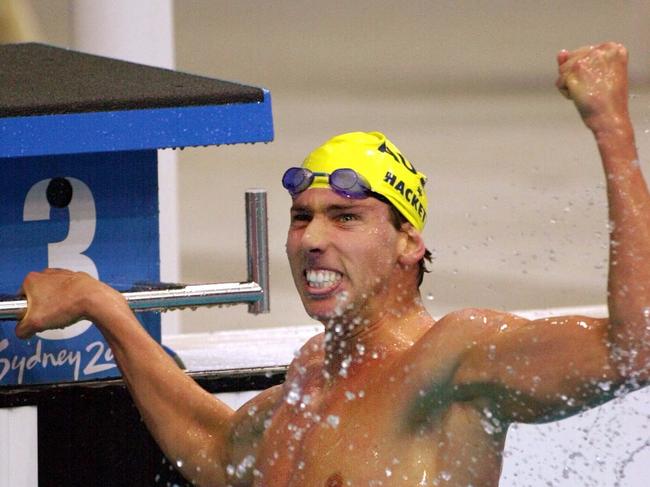 Grant Hackett celebrates winning the gold medal in the men's 1500m freestyle at the Sydney International Aquatic Center during the Summer Olympics in Sydney. Dual Olympic swimming champion Grant Hackett announced his retirement Monday after almost a decade of dominance in the 1,500 meters. (AP Photo/David Longstreath, File)